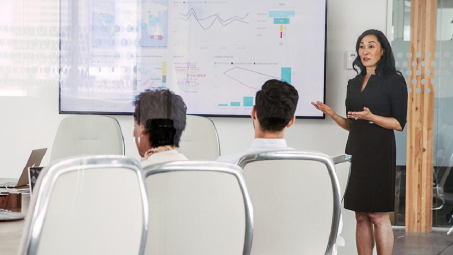 woman presenting on board