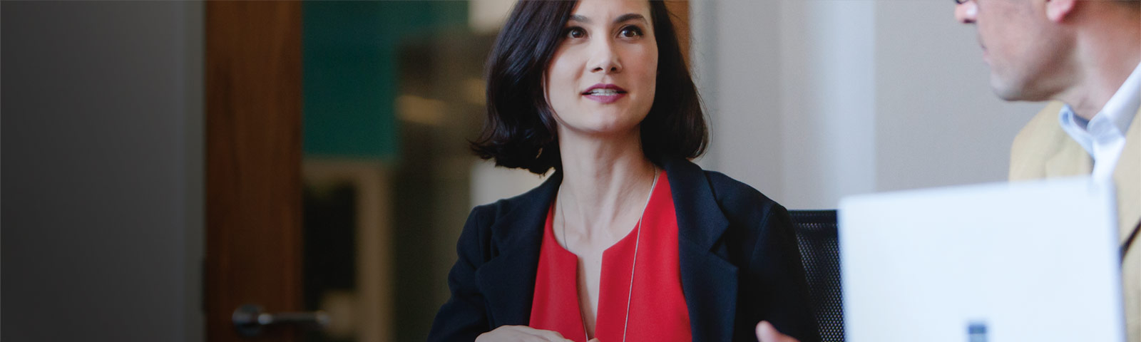 Woman working with colleagues