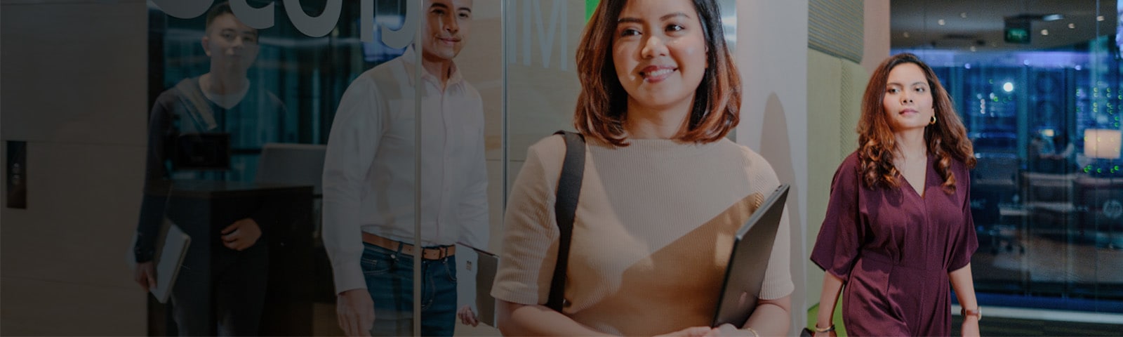 woman smiling at colleagues