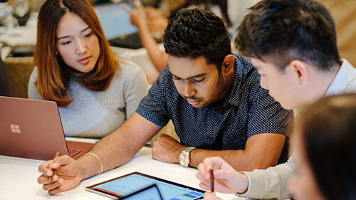 Three person are in meeting