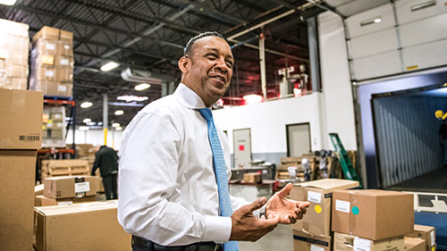 A man is explaining to someone