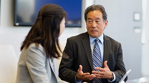 man and woman talking