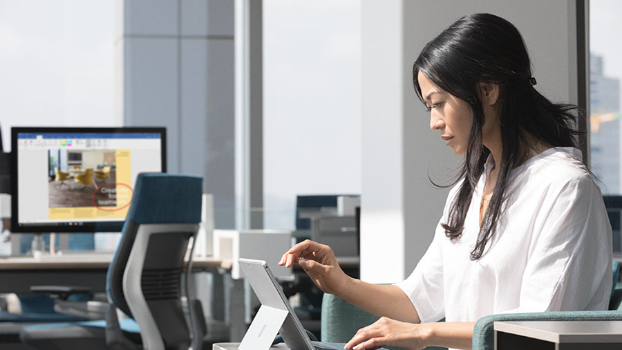 A woman working on tablet
