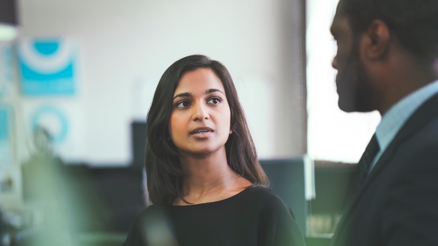 man and woman talking