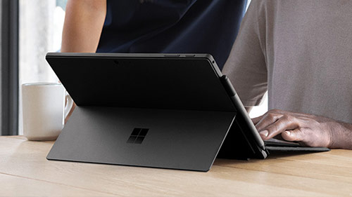 A man working on the tablet