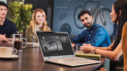 four person in a meeting