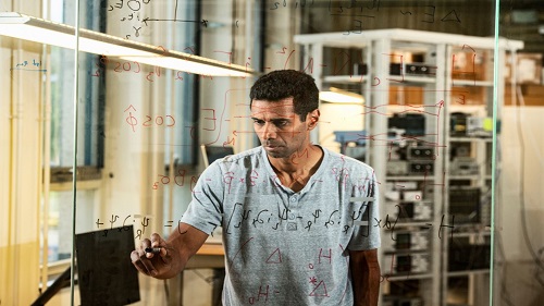 man writing on the screen