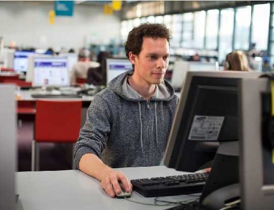 A man working on desktop
