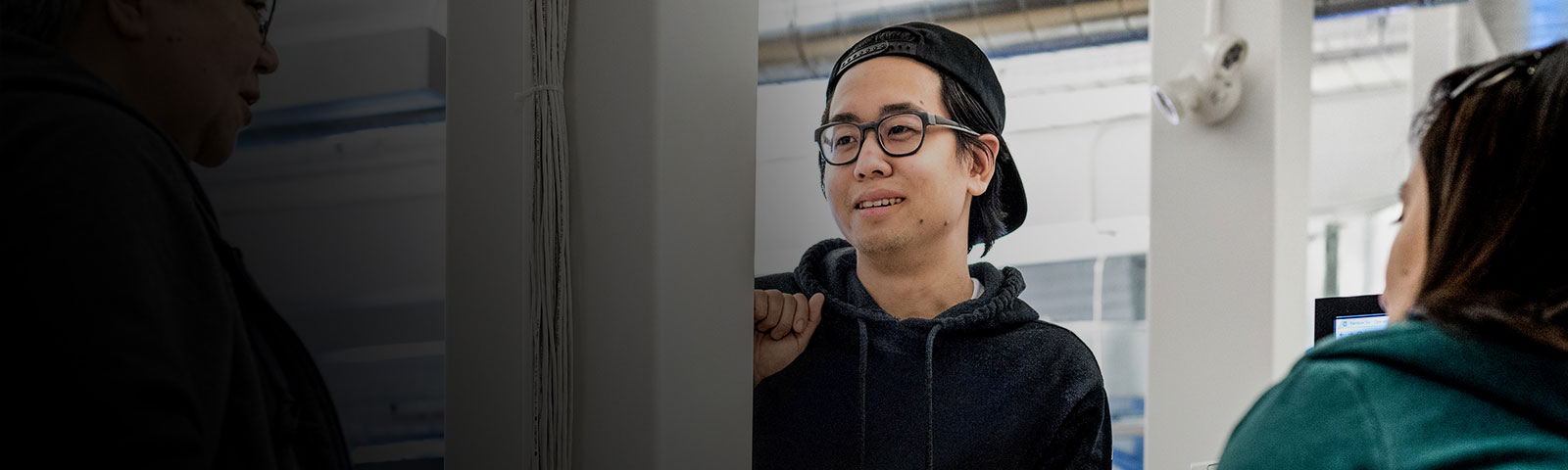 3 people in discussion