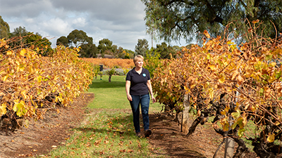 Woman walking in vineyard
