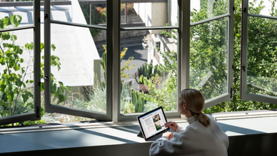 Woman working in a green office
