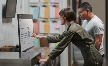 Two professionals reviewing analytics