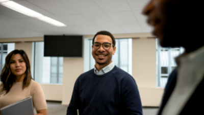 Office workers smiling