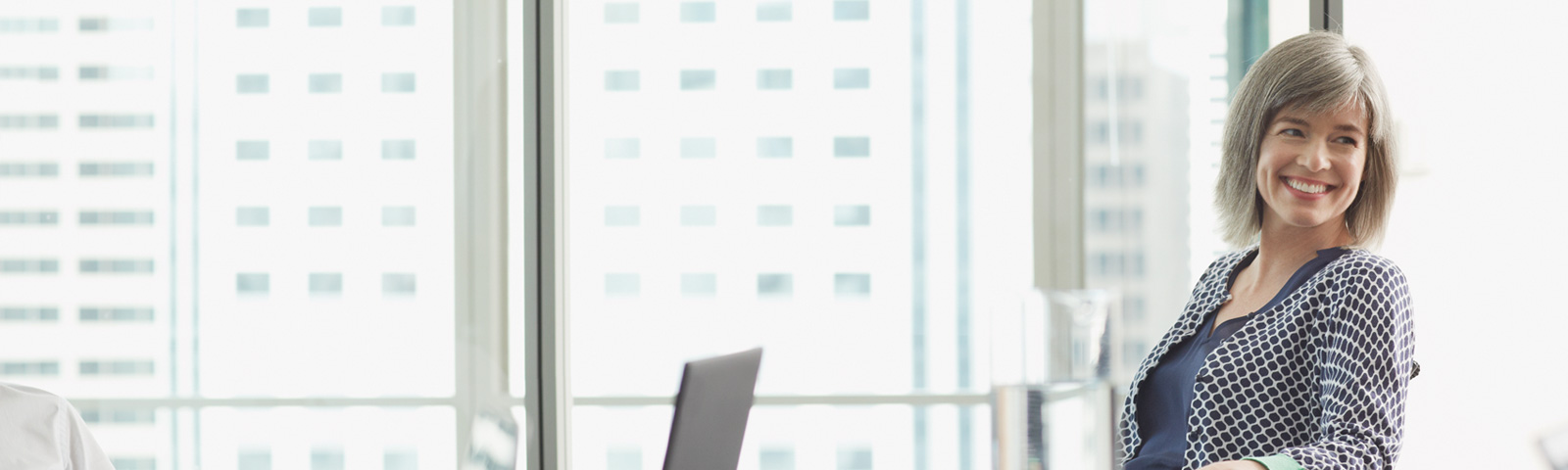 A woman in a conference room 