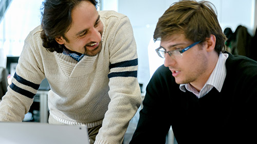 Two colleagues conversing