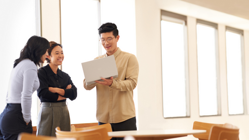Women presents security topics in a conference room