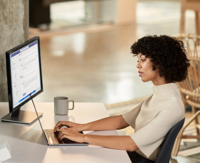 A woman chatting on her laptop