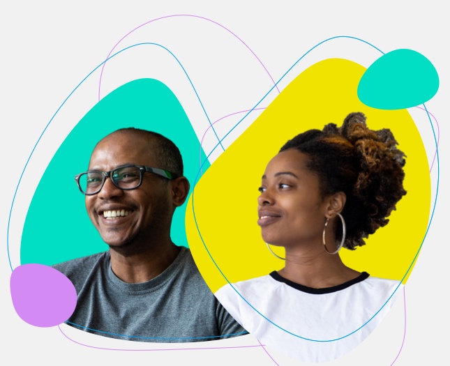 Two people smiling in front of colorful graphic shapes