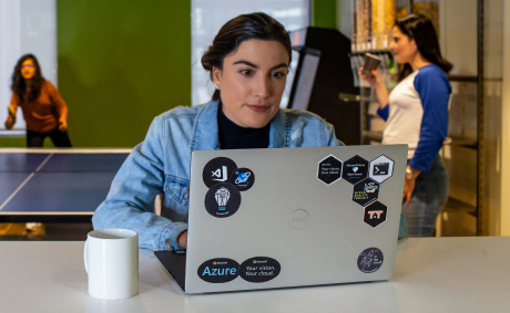 A woman working with her laptop