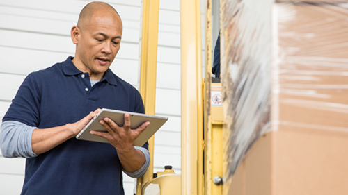 Man working on Surface tablet