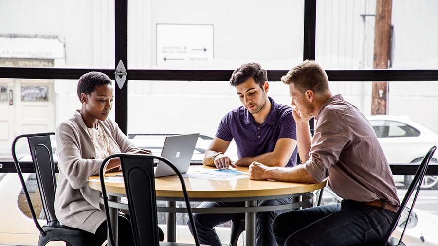 Woman working on surface laptop