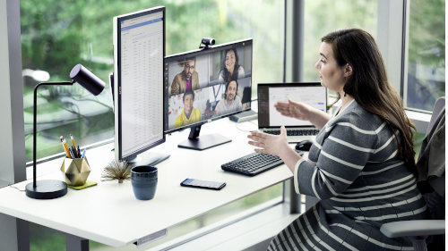 Women working with desktop
