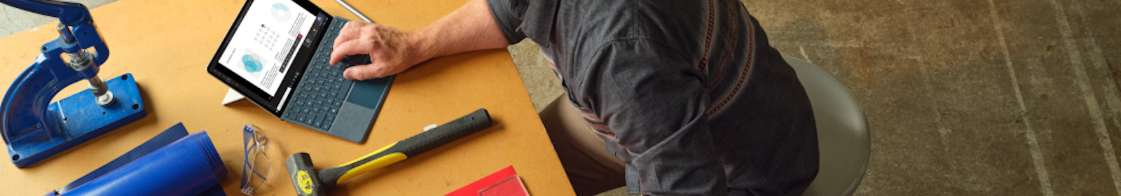 Man sitting at desk with notebook