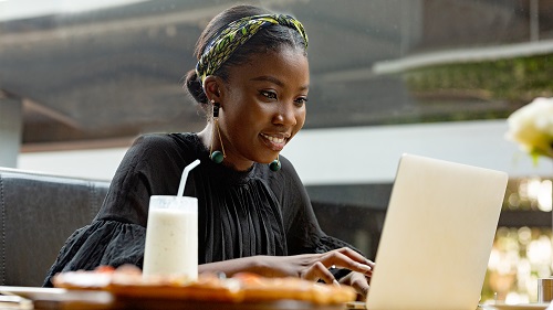 A young woman working on her laptop