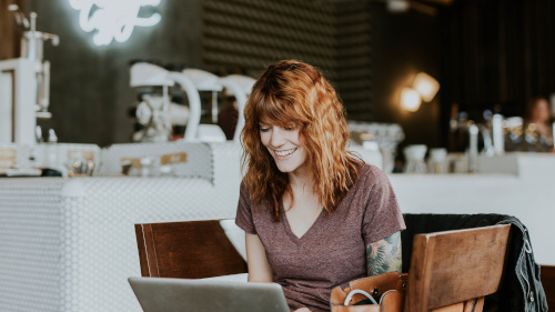 Woman working on notebook