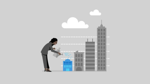 Woman watering buildings