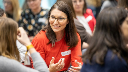 image of a woman explaining  something