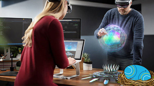 image of two people in front of a 3D hologram