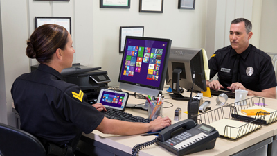 Two people in government work with Microsoft