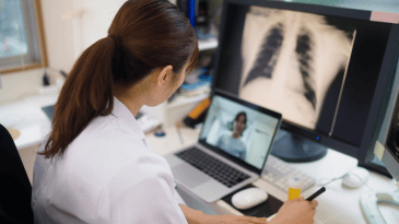 Medical professional speaking with patient on a video call