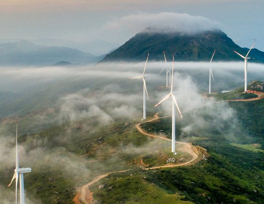 Mountain landscape with wind turbines
