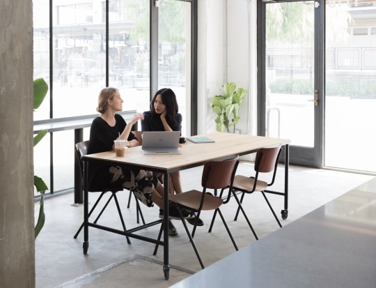 Colleagues working on Surface device