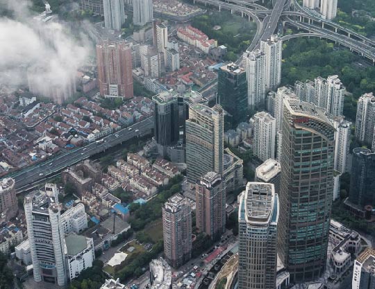 Aerial view of city skyline with clouds