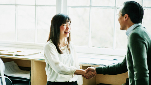 Two people shaking hands
