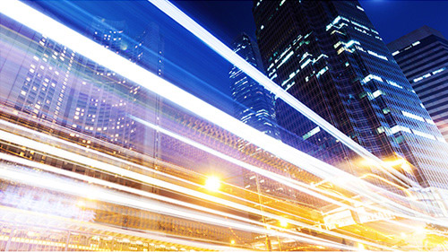 Blurred traffic on a city skyline