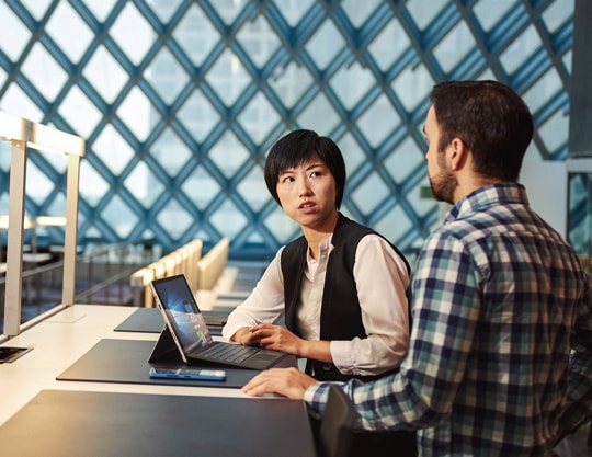 man and woman in conversation