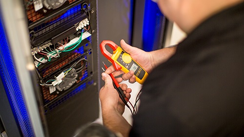 man working on servers