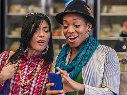 Two friends posing for a selfie 