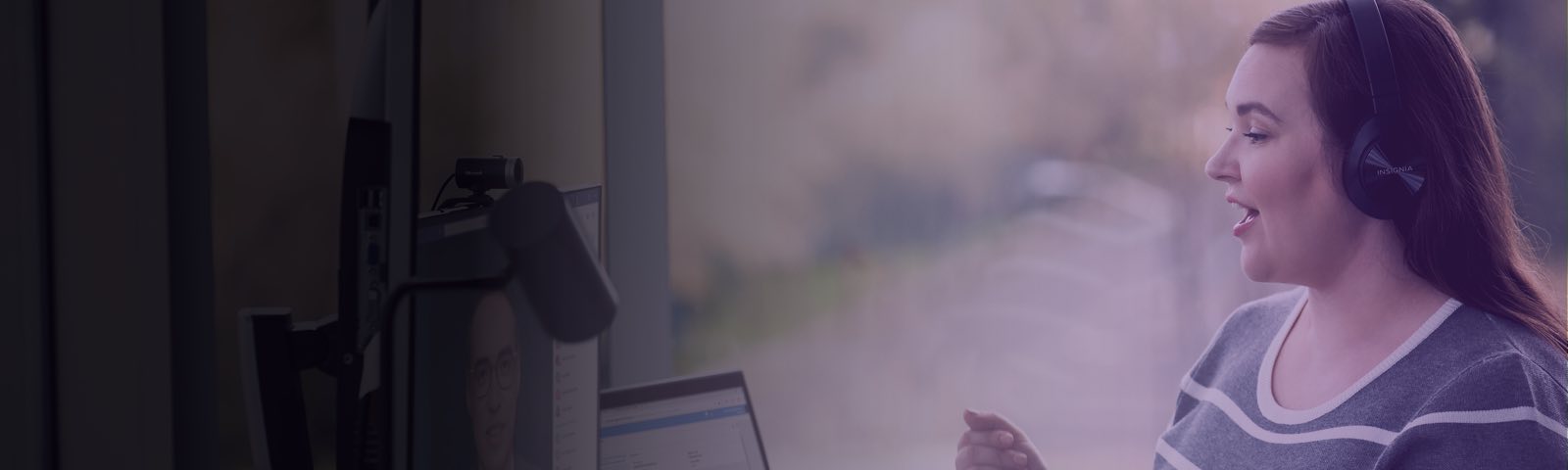 Person wearing headphones talking on a video call
