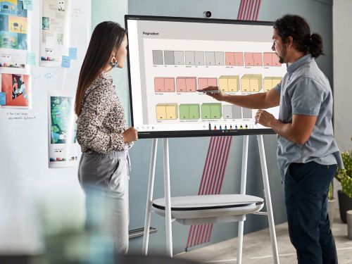 People using Surface Hub 2S in classroom