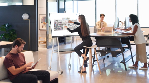 People around a Surface Hub