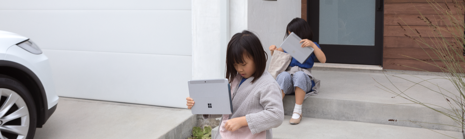 Kids using Surface products