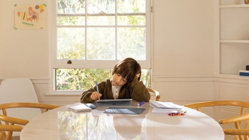 Child using Surface in Kitchen