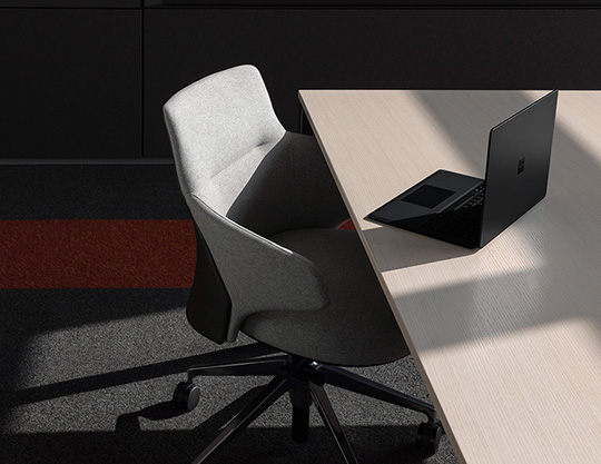 Contextual image of black Surface Laptop2 at modern desk