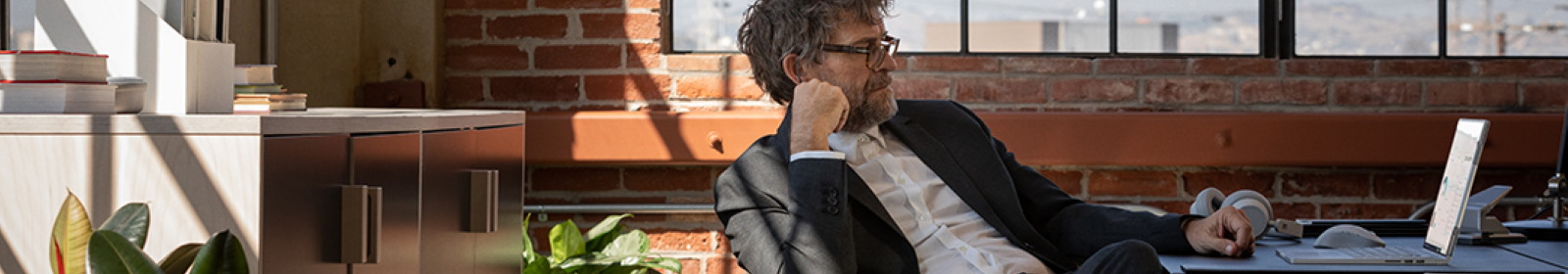 Person using a Surface Book 3 on a desk