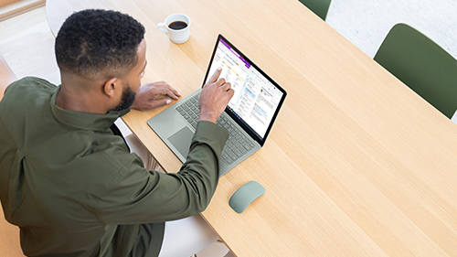 Person using Surface Laptop 5